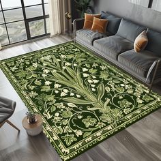 a living room with a couch, chair and rug that has an ornate design on it