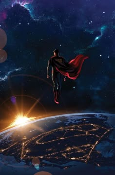 the man is flying over the earth at night with his red cape around his neck