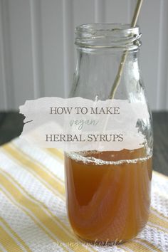 a jar filled with liquid sitting on top of a table