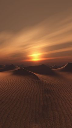 the sun is setting over sand dunes in the desert with no people or animals on it