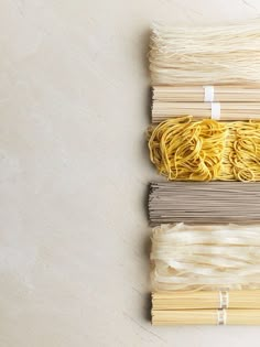 several different types of noodles laid out on top of each other