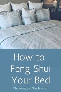 a bed with white pillows and blue comforter in the foreground text reads how to feng shui your bed