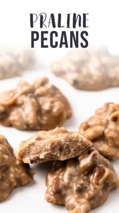 some cookies that have been cut in half and stacked on top of each other with the words pralie pecans above them