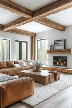 a living room filled with furniture and a fire place in the middle of two windows