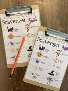 two halloween scavenger hunt cards on a clipboard with an orange pencil next to it