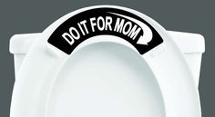 a white toilet with a do it for mom sticker on the lid