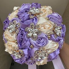 a bridal bouquet with purple and white flowers