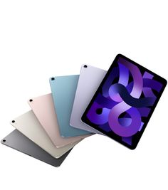 four ipads are stacked on top of each other, with the same color and size