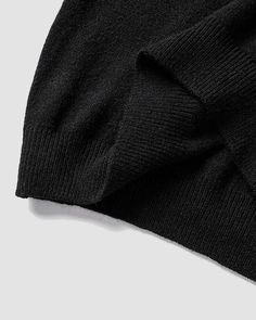 Details: Long-sleeve sweater with graphical designTop Length: NormalSleeve Length: Long SleevesMaterials: 95% Polyester + 5% Spandex Black Crew Neck Cardigan For Streetwear, Black Knit Tops For Streetwear, V-neck Sweater Vest For Winter Streetwear, Black Stretch Sweater With Ribbed Cuffs, Black Knit Cardigan With Ribbed Cuffs, Black Crew Neck Cardigan For Layering, Black Cotton Sweater Vest For Fall, Black Cotton Sweater Vest For Winter, Black Winter Layering Tops