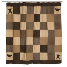 a brown and black checkered shower curtain with stars on the bottom, and a bird in the middle