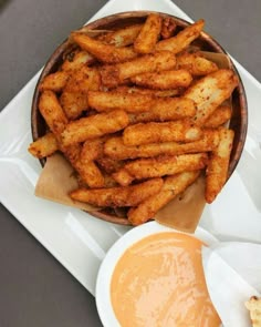 french fries and dipping sauce on a plate