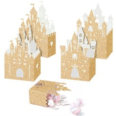 there are three pieces of cardboard that look like castle