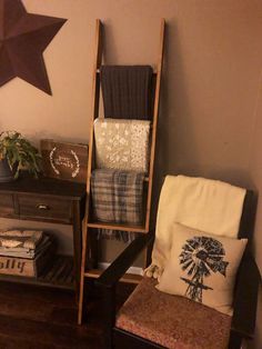 a chair and table in a room with a star on the wall next to it