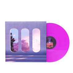 a pink vinyl record with three windows and trees in the background, against a white backdrop