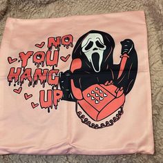 a pink scarf with an image of a ghost holding a heart and the words no you have up written on it