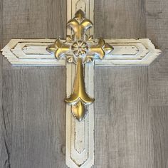 the cross is painted white and gold