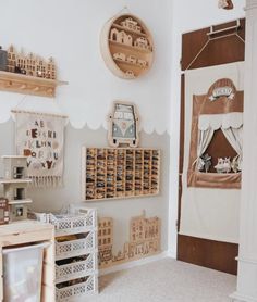 a room filled with lots of wooden toys