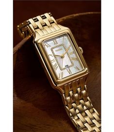 Fossil Women's Raquel Three-Hand Date Gold-Tone Stainless Steel Watch | Dillard's Timeless Watch With Box Clasp And Round Dial, Timeless Watch With Box Clasp, Timeless Watch With Round Dial And Box Clasp, Timeless Watches With Box Clasp And Round Dial, Classic Watch With Rectangular Metal Dial, Classic Metal Watch With Rectangular Dial, Classic Metal Jewelry And Watches With Polished Finish, Women’s Gold Watch, Three Hands