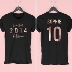 two t - shirts with the same name and number on them, one is pink