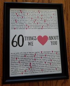 a framed print with the words 60 things about you in red and pink hearts on it