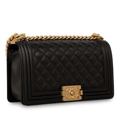 Chanel presents one of its highly-acclaimed and most sought after bags, the Chanel Boy Bag in size Old Medium in the wonderful and limited combination of Deep Navy Lambskin Leather and Antique Gold Hardware. As designed by Karl Lagerfeld, the Boy Bag collection was established to embody boyish charm and femininity. SPL Exterior   Black Quilted Calfskin Leather Old Medium size CC push-lock Antique gold hardware  Chain-link strap Immaculate condition - minimal/no sign of use   Serial number 25XXXXXX - Year of Production 2018  Interior   Black fabric grosgrain lining Single storage compartment  One large slip pocket Immaculate condition - no stains/marks  Full set - sold with dustbag, box and ity card  SPL  Height 15cm  Width 25cm  Depth 9cm Bag Collection, Timeless Handbag, Black Quilt, Chanel Boy, The Boy, Exclusive Bag, Chanel Boy Bag, Leather Mini, Lambskin Leather