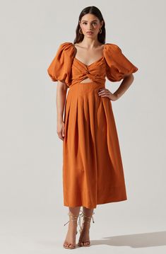 Short sleeve midi dress Concealed zipper closure on back Cutout on bodice Tulip sleeves Dry clean only Shell: 90% Lyocell, 10% Linen / Lining: 100% Rayon Style# ACDR101649L Short Sleeve Wedding Guest Dress, Nola Elopement, Bali Outfit, Orange Outfits, Apricot Dress, Dress Code Wedding, Puff Sleeve Midi Dress, Short Sleeve Midi Dress, Brunch Dress