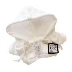 a white hoodie with a teddy bear patch on the front and back, attached to a keychain