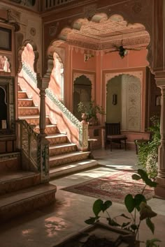 the interior of an ornately decorated building with stone stairs and carved pillars, surrounded by greenery