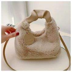 SPECIFICATIONSBrand Name: YIYUEQIANLIHign-concerned Chemical: NoneHandbags Type: Shoulder BagsTypes of bags: Shoulder & Crossbody BagsMain Material: PlushLining Material: Faux FurShape: SQUAREPlace Of Origin: HE BEI ProvincePlace Of Origin: HE BEI ?ProvinceOrigin: Mainland ChinaCN: HubeiHardness: SOFTPattern Type: SolidClosure Type: zipperGender: WOMENStyle: fashionNumber of Handles/Straps: SingleChoice: yessemi_Choice: yes Winter Tote, Faux Fur Handbag, Tas Bahu, Winter Bags, Fur Handbags, Beg Tangan, Plush Bags, Crossbody Bags For Travel, Small Lady