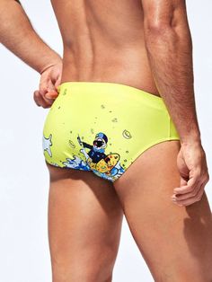 Make a splash and express your fun-liking personality with our Cartoon Graphic Swim Brief. Designed for adventurous people, these swim briefs feature vibrant and playful cartoon graphics that bring your swimwear to life. The elastic waistband ensures a snug fit, while the quick-drying fabric keeps you comfortable in and out of the water. Features: Pattern Type: Cartoon Fabric: Medium Stretch Material: Fabric Composition: 82% Polyester, 18% Elastane Size Chart ( Inches ): Size Length Waist Size S Playful Graphic Print Swimwear, Playful Printed Swimming Bottoms, Casual Summer Swimwear With Character Print, Summer Beach Swimwear With Cartoon Print, Cartoon Print Swimwear For Summer, Summer Cartoon Print Swimwear, Cartoon Print Swimwear For Summer Swimming, Cartoon Print Swimwear For Summer Pool Time, Summer Cartoon Print Swimwear For Pool