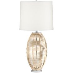 a table lamp with a white shade on the base and a light in front of it