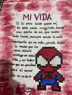 a piece of paper with an image of a spiderman on it and the words mi vida written in spanish