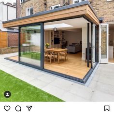 an extension to a house with sliding glass doors