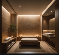 a spa room with a large bed and lights on the walls, along with two sinks