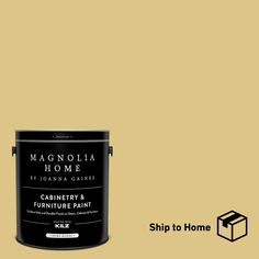 a can of paint with the words magnolia home painted in black and white on it