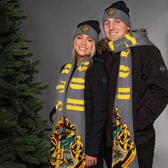 Whether heading to a QUIDDITCH game or heading out onto school grounds, you'll be warm and winter-ready with this Hogwarts knit beanie and scarf combo. This Hogwarts Crest set features an interwoven Hogwarts crest design on the scarf, and the beanie features a Hogwarts embroidered patch. This great acrylic winter set will be great for any Harry Potter fan and make an excellent gift too! Quidditch Game, Scarf Cuff, Hogwarts Gryffindor, Harry Potter Accessories, Harry Potter Wizarding World, Crest Design, Hogwarts Crest, Crest Logo, Logo Knit