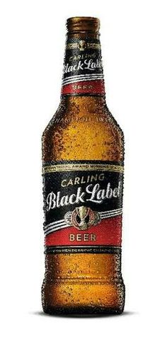 a bottle of beer that is sitting on a white surface with the words black label