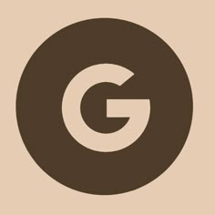 a brown circle with the letter g in it