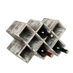 a wine rack with several bottles in it