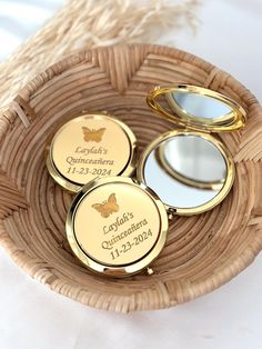 three personalized compact mirrors in a basket