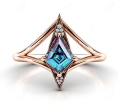 We are Pleased to welcome you in our Store-    TheLesBijoux Short Description about the item-  This ring is Made With a kite Cut Alexandrite Gemstone and the accented stones in this ring ., are the Moissanite to adorn the look of this beautiful ring ..a unique piece to wear occasionally or can be used regularly. Can be offered as a gift to your loved ones, to make them feel special. MATERIAL AVAILABILITY- ( 925 Sterling Silver/ 14k solid gold(white gold / rose gold / yellow gold?  950 Solid Platinum  We make sure that you know that you're getting high quality hand-made crafted jewelry when you purchase items from our store. This beautiful ring is made to order. Available in all the Required Materials. ( 925 Sterling Silver/ 14k/18k solid gold(white gold / rose gold / yellow gold can be mad Blue Topaz Wedding Ring, Alexandrite Wedding Ring, London Blue Topaz Engagement Ring, Vintage Anniversary Rings, London Blue Topaz Engagement Rings, Topaz Wedding Ring, Vintage Anniversary, Alexandrite Engagement Ring