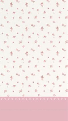 a pink and white floral wallpaper with hearts on the bottom right hand corner,