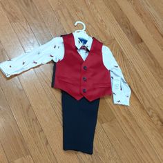 Toddler Boy 3 Pc Outfit Features: Red Velvet Vest White Long Sleeve Reindeer Print Top W/ Bow Tie Black Pants Playful Red Fitted Sets, Playful Red Fitted Set, Playful Fitted Red Sets, White And Red Outfit, Velvet Vest, Vest White, Red Outfit, Print Top, White Long Sleeve