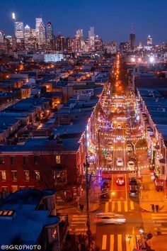 an aerial view of a city at night