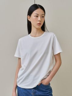 This is a feminine and modern top by WEARIS that is made out of high quality and sturdy material. With distinctive mood of the design and comfortable wear, you can style it for your comfortable daily outfit.- Basic and clean design- Silket cotton fabric with soft touch- Modern and minimal mood Trendy White Organic Cotton Tops, Minimalist Crew Neck T-shirt, Minimalist Relaxed Fit Tops In Organic Cotton, Relaxed Fit Minimalist Tops In Organic Cotton, Minimalist Relaxed Fit Organic Cotton Tops, Relaxed Fit Minimalist Organic Cotton Tops, Simple Relaxed Fit Top For Everyday, Simple Top For Casual Gatherings In Spring, Basic Plain Cotton Top