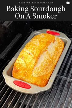 a loaf of bread sitting on top of an open grill with the words baking sourdough on it