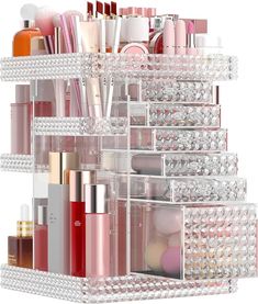 There are many different types of makeup case organizers. Some are small and just hold a few things like a makeup bag with compartments. Others are bigger and have drawers and spaces for lots of makeup like a makeup train case. Makeup case organizers can be made of plastic fabric or even metal. Some have handles or straps to carry them easily. Different Types Of Makeup, Rotating Makeup Organizer, Perfume Organizer, Makeup Vanities, Perfume Organization, Diy Drawers