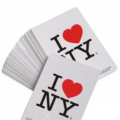 i love ny playing cards are stacked on top of each other