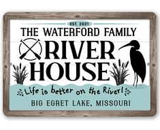 a sign that says the waterfront family river house, life is better on the river