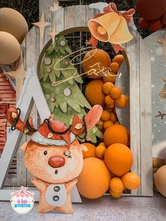 an image of a christmas display with oranges and other things in the foreground